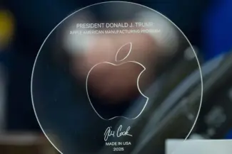 Tim Cook Gifts Trump a Trophy to Strengthen Apple's Influence 11